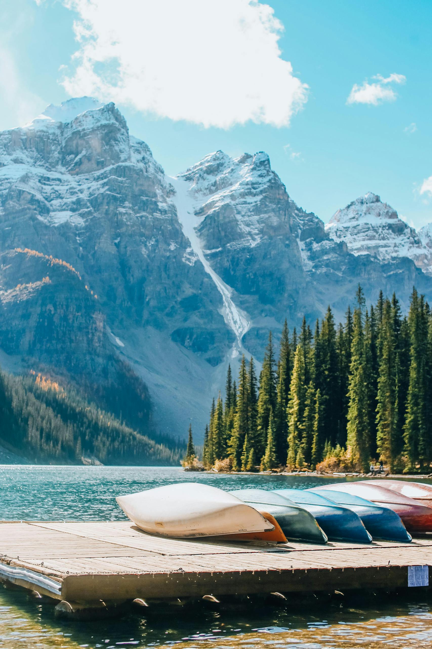 Banff moraine lake Boats on a Wooden Deck